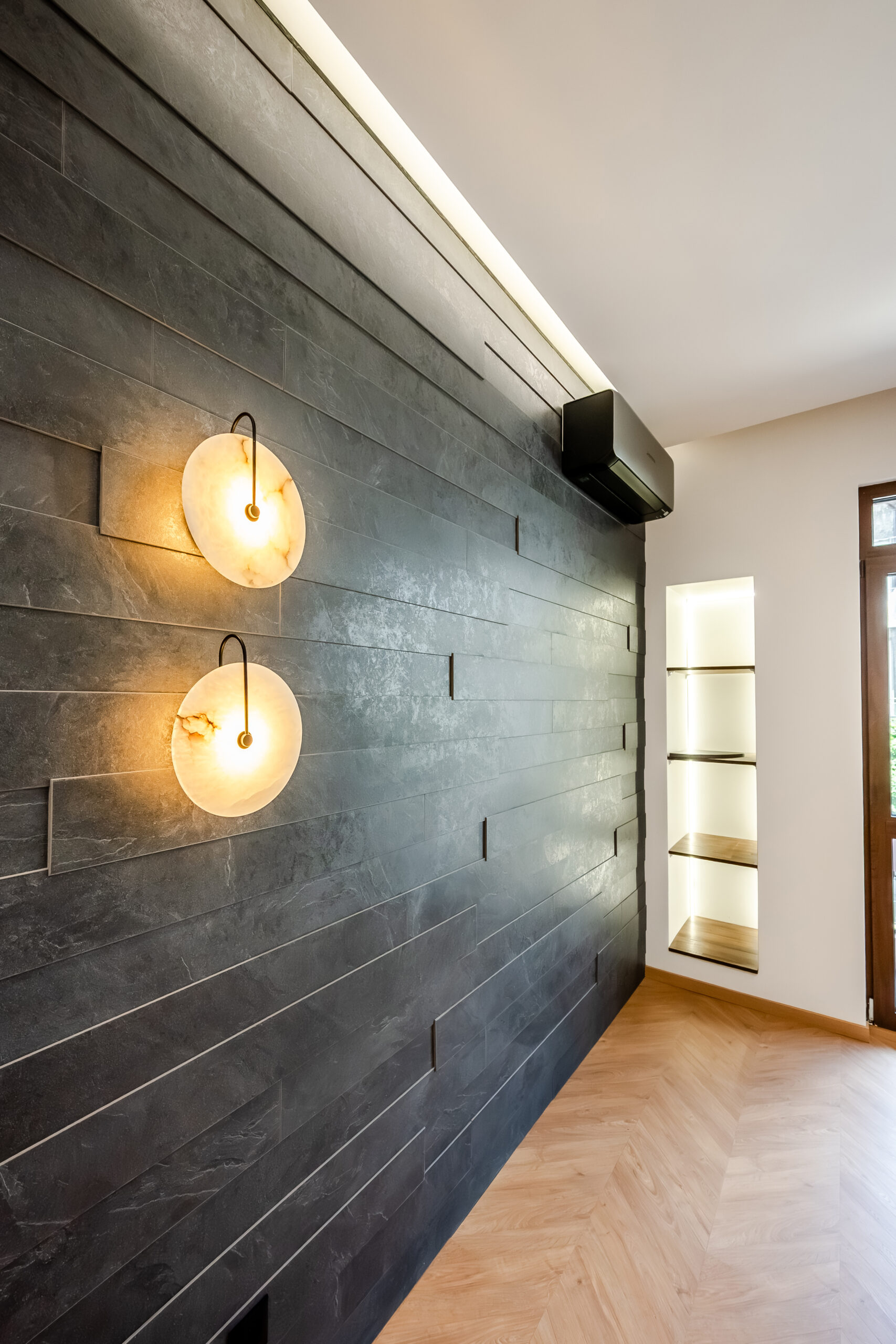 Custom feature wall with decorative lighting